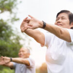 Elderly People Stretching Hands Arms Before Exercise Park Happy Asian Senior Couple Enjoying Workout Outdoor Morning 40048 211 150x150
