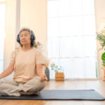 Happy Asian Senior Woman Meditating 600nw 2655273401 150x150